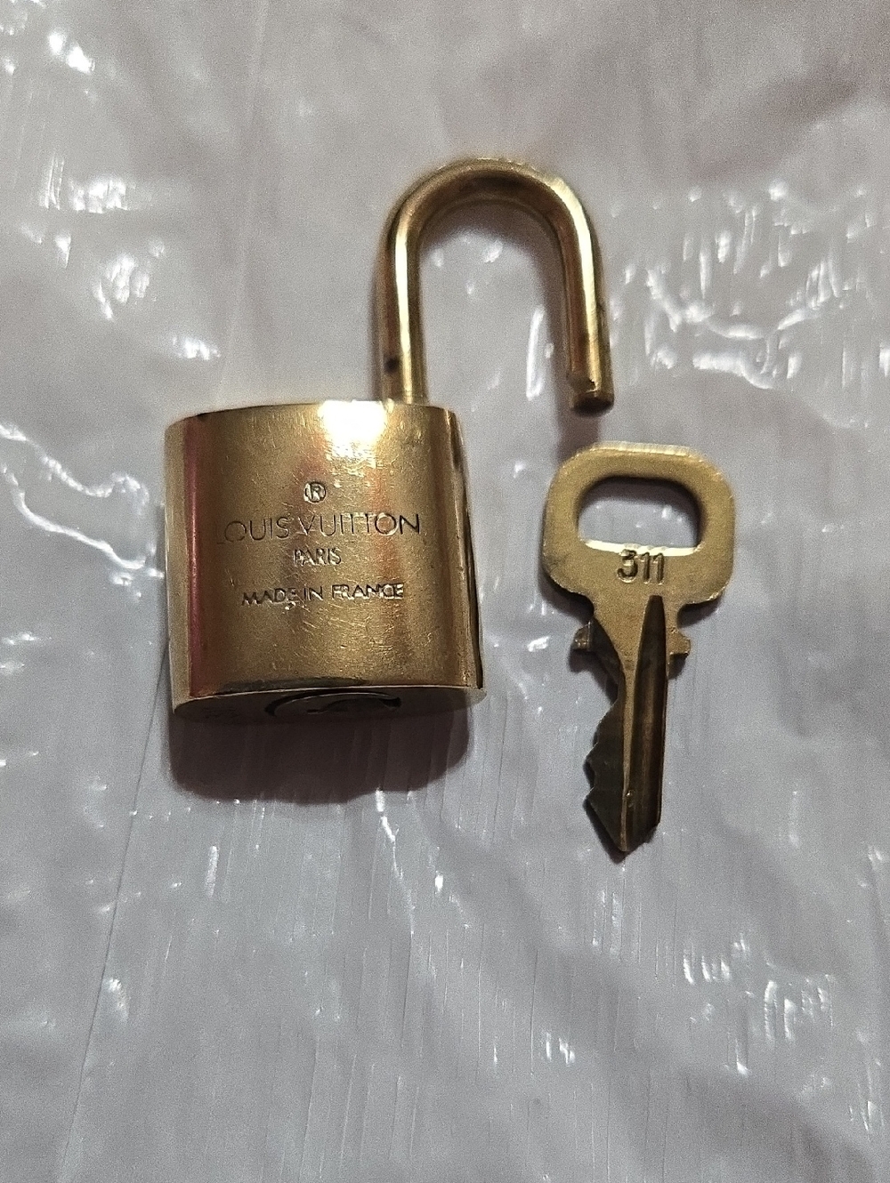 Louis Vuitton Gold Padlock Set of Four with LV Monogram - Picture 6 of 6